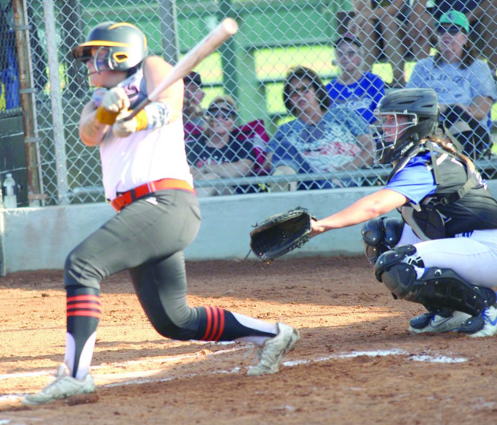 Lady Dragons open fastpitch campaign with runrule wins